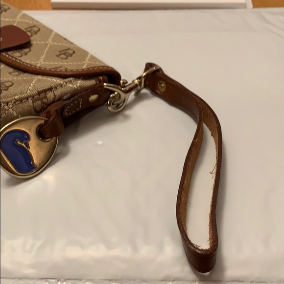 Dooney & Bourke tan & brown button flap wristlet - Picture 8 of 8